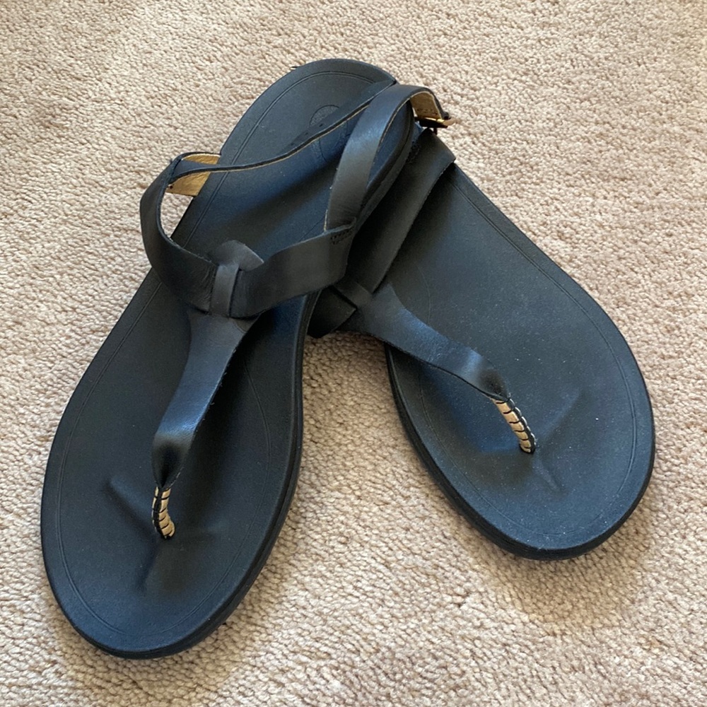 Black Olukai sandals. Brand new, no tags.